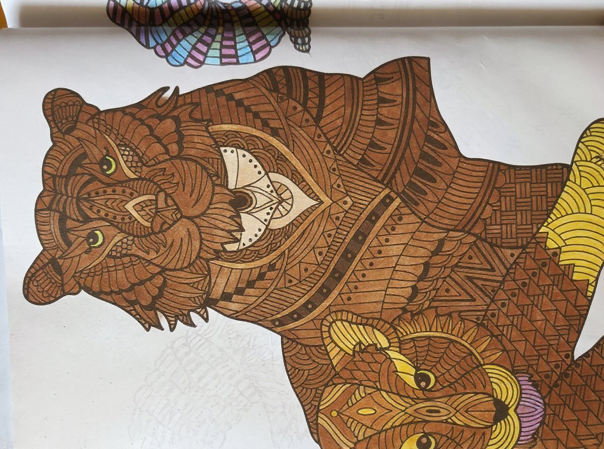 Printable coloring page featuring brown woodland animals